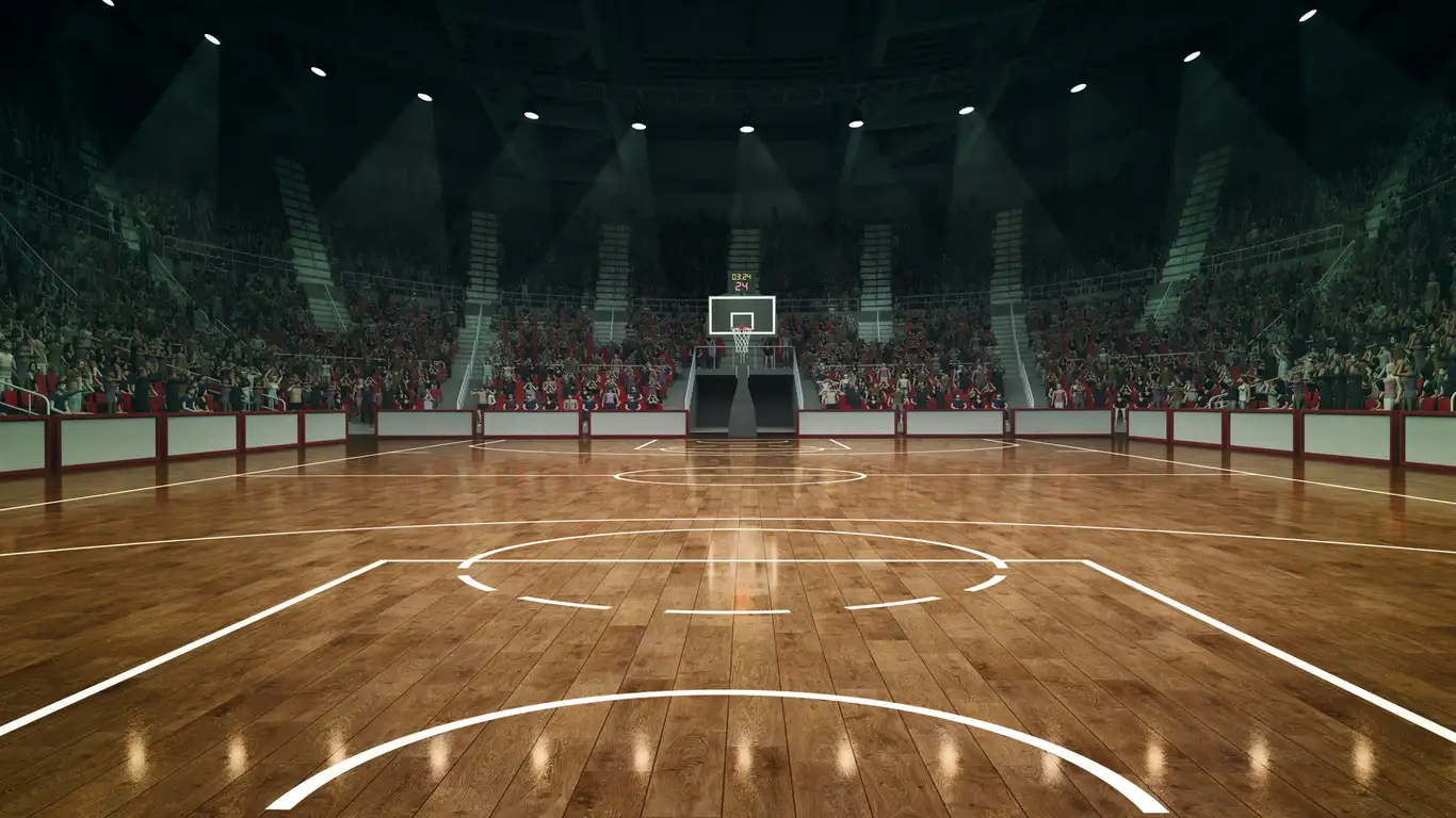 Imagem de uma quadra de basquete bem iluminada, com refletores fortes no teto, piso de madeira polido e marcações visíveis no chão.